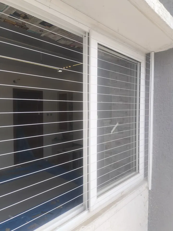 Window Invisible Grills installation by Perumal Safety Nets