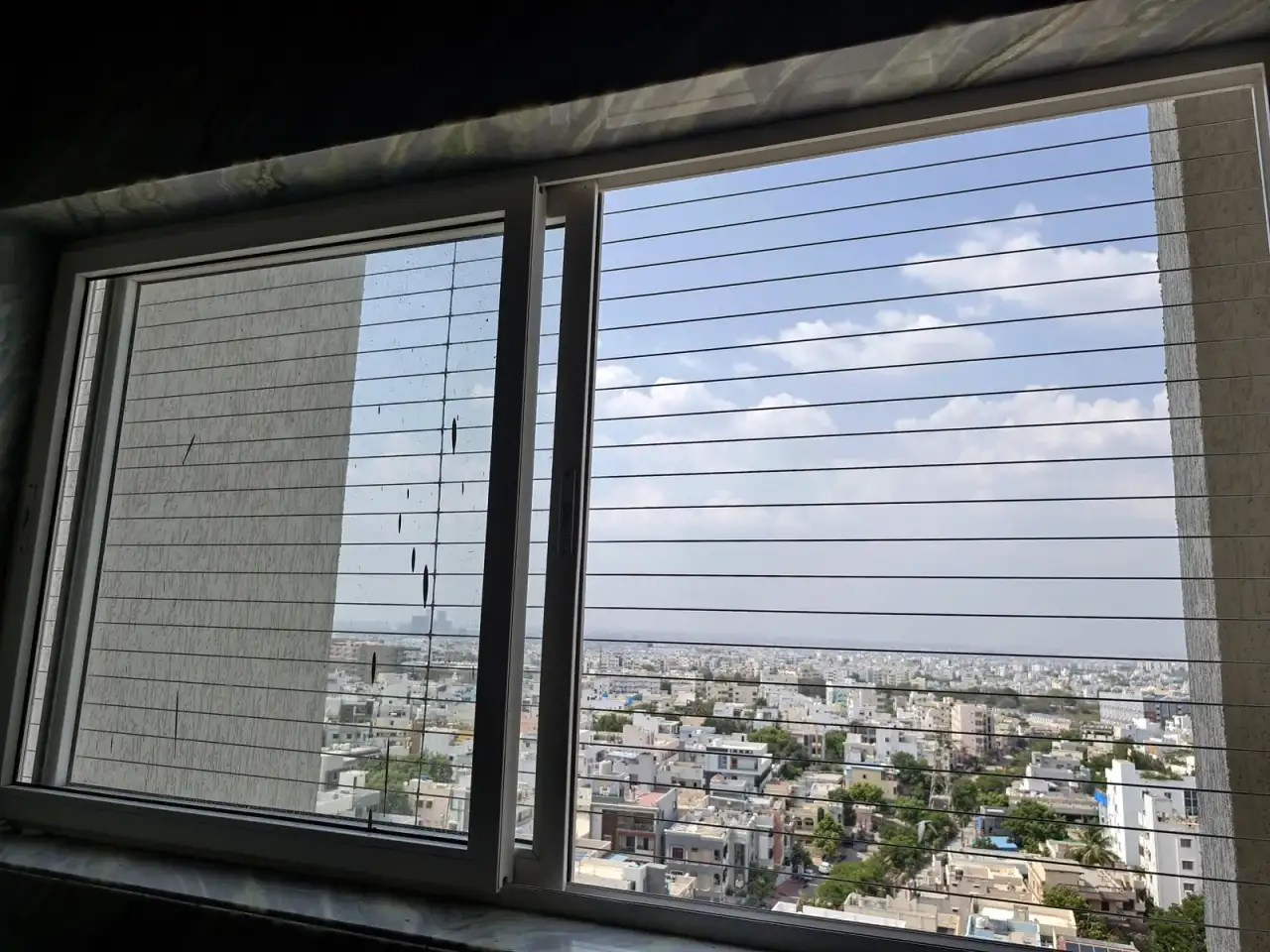Horizontal Invisible Grills installation by Perumal Safety Nets