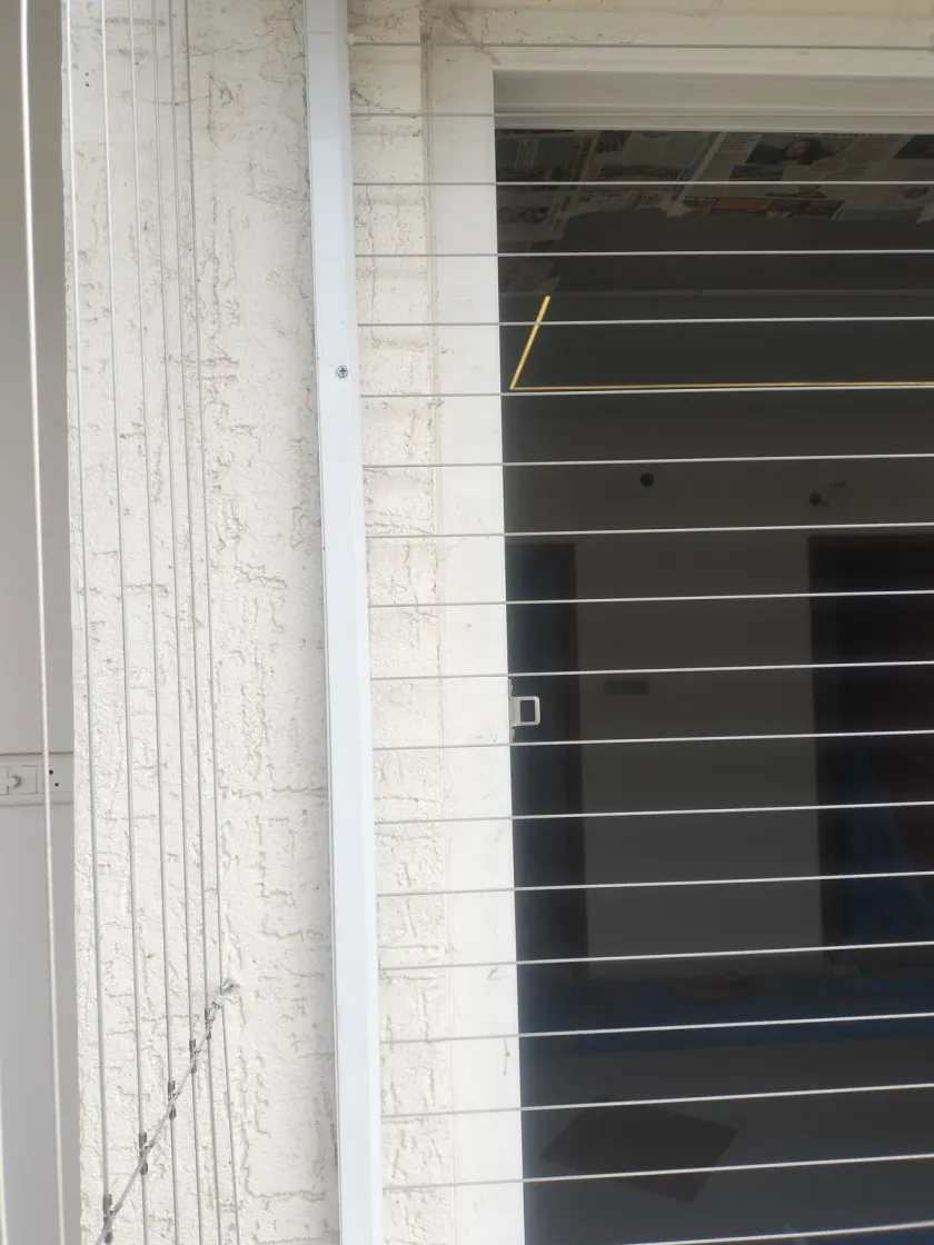 Window Invisible Grills installation by Perumal Safety Nets