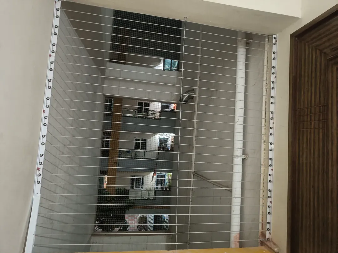 Horizontal Invisible Grills installation by Perumal Safety Nets