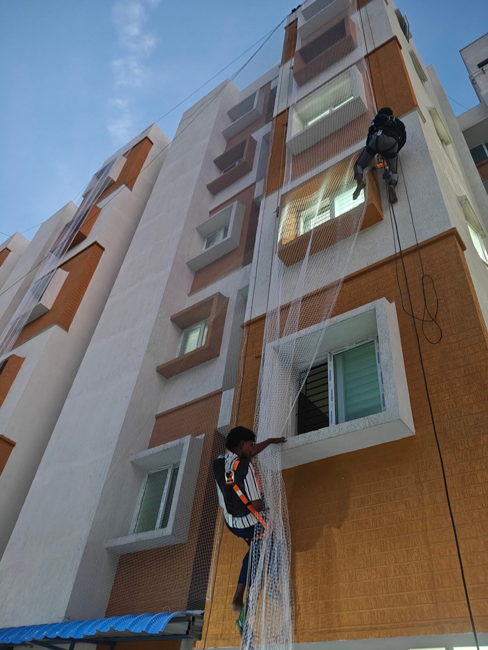 Perumal Safety Nets team carrying out a safety installation in Chennai